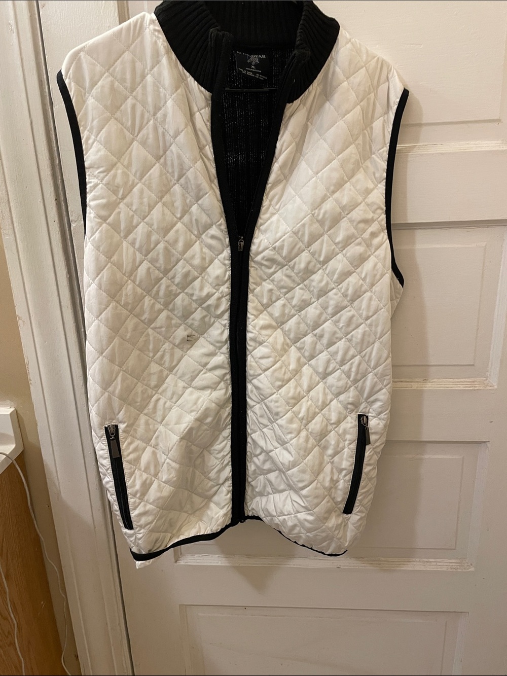 Quilted White Sleeveless Vest with Black Trim